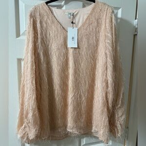 Nude, pink, long sleeve boutique blouse size large with feathers